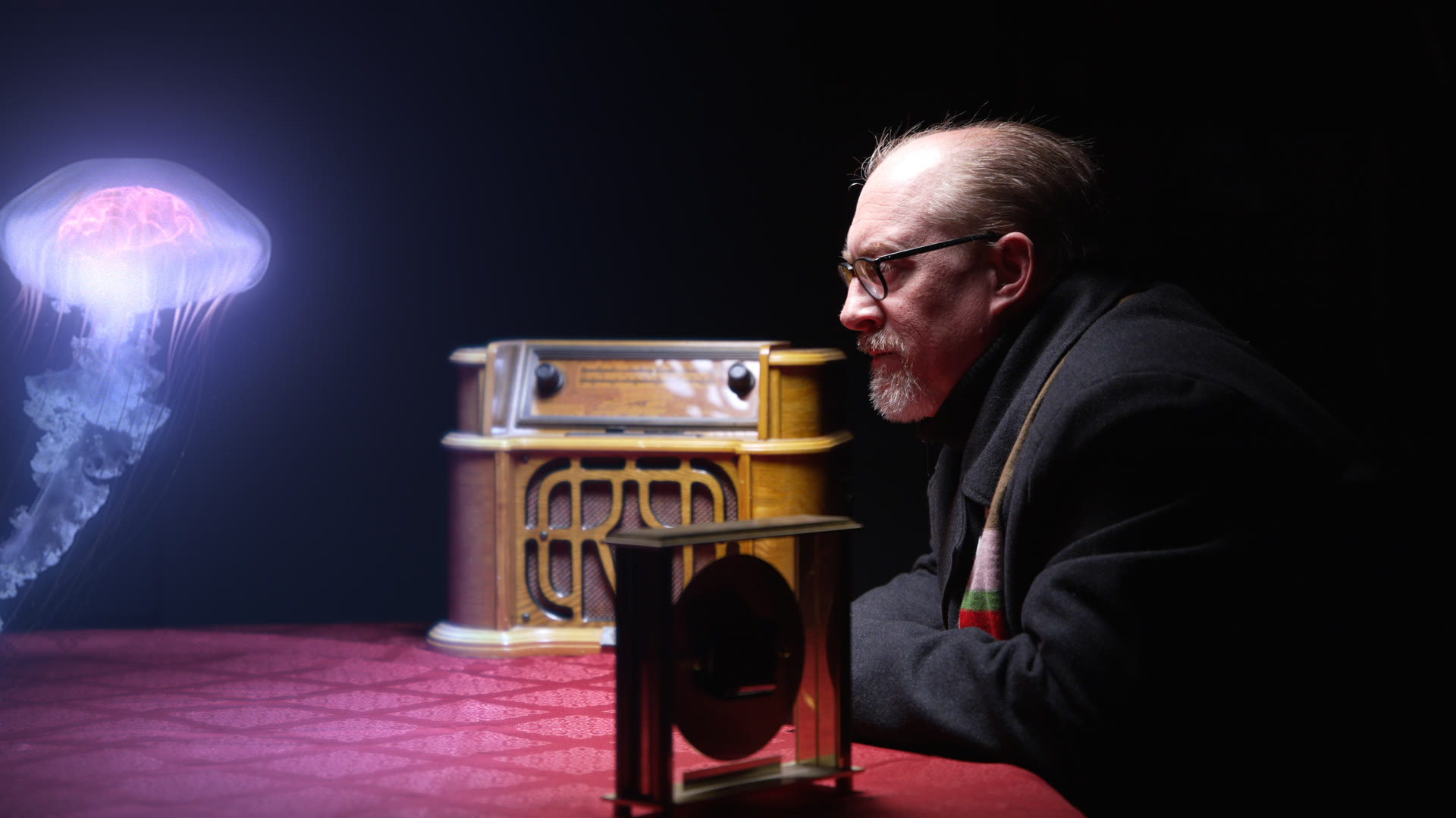 A still from TRANS-FICTION: stage light falling on the opera singer mid-performance